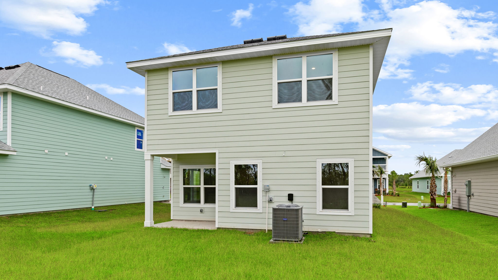Monroe floor plan at WindMark Beach rear of home with covered rear patio.