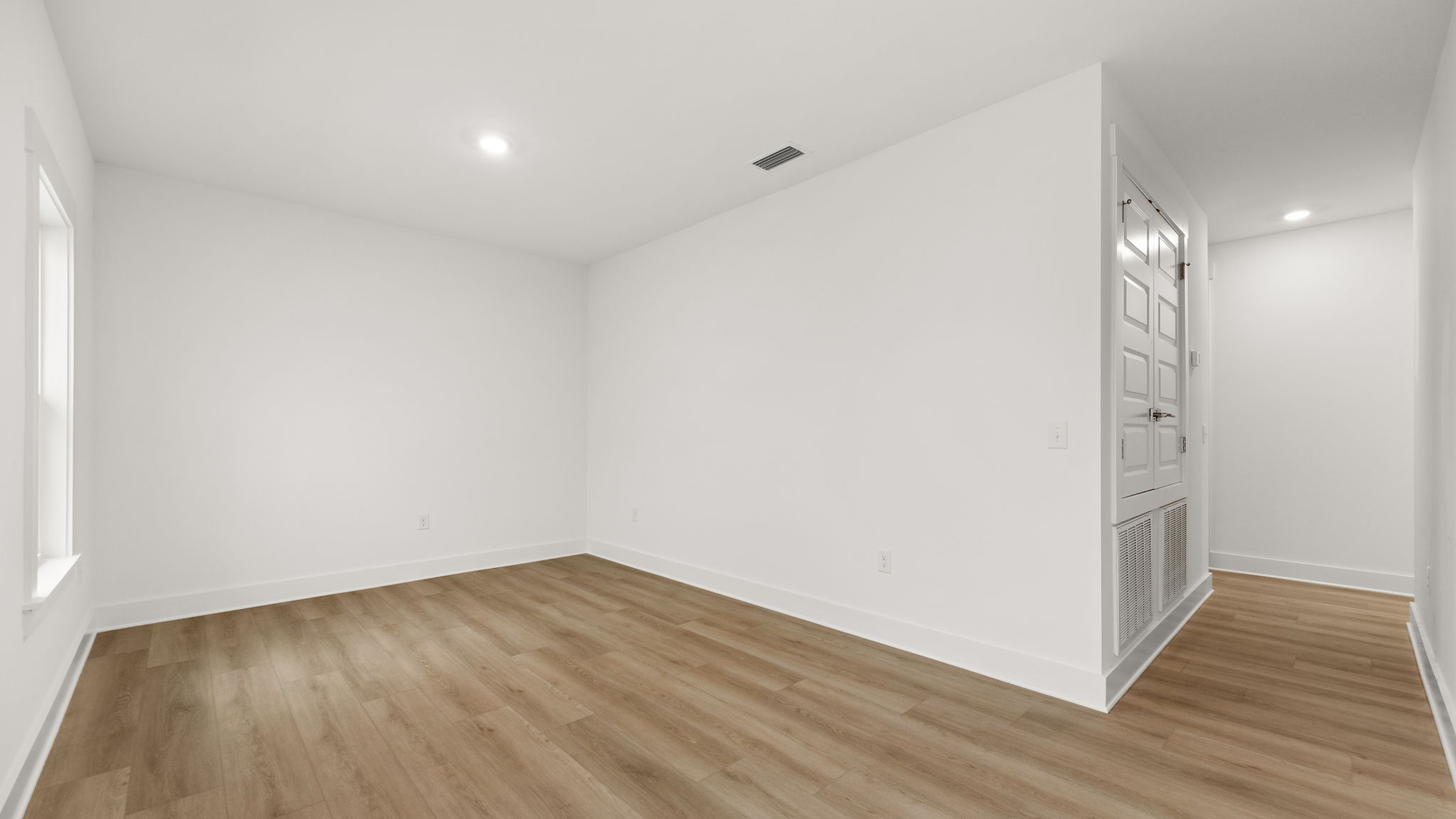 Upstairs bonus area with EVP flooring.