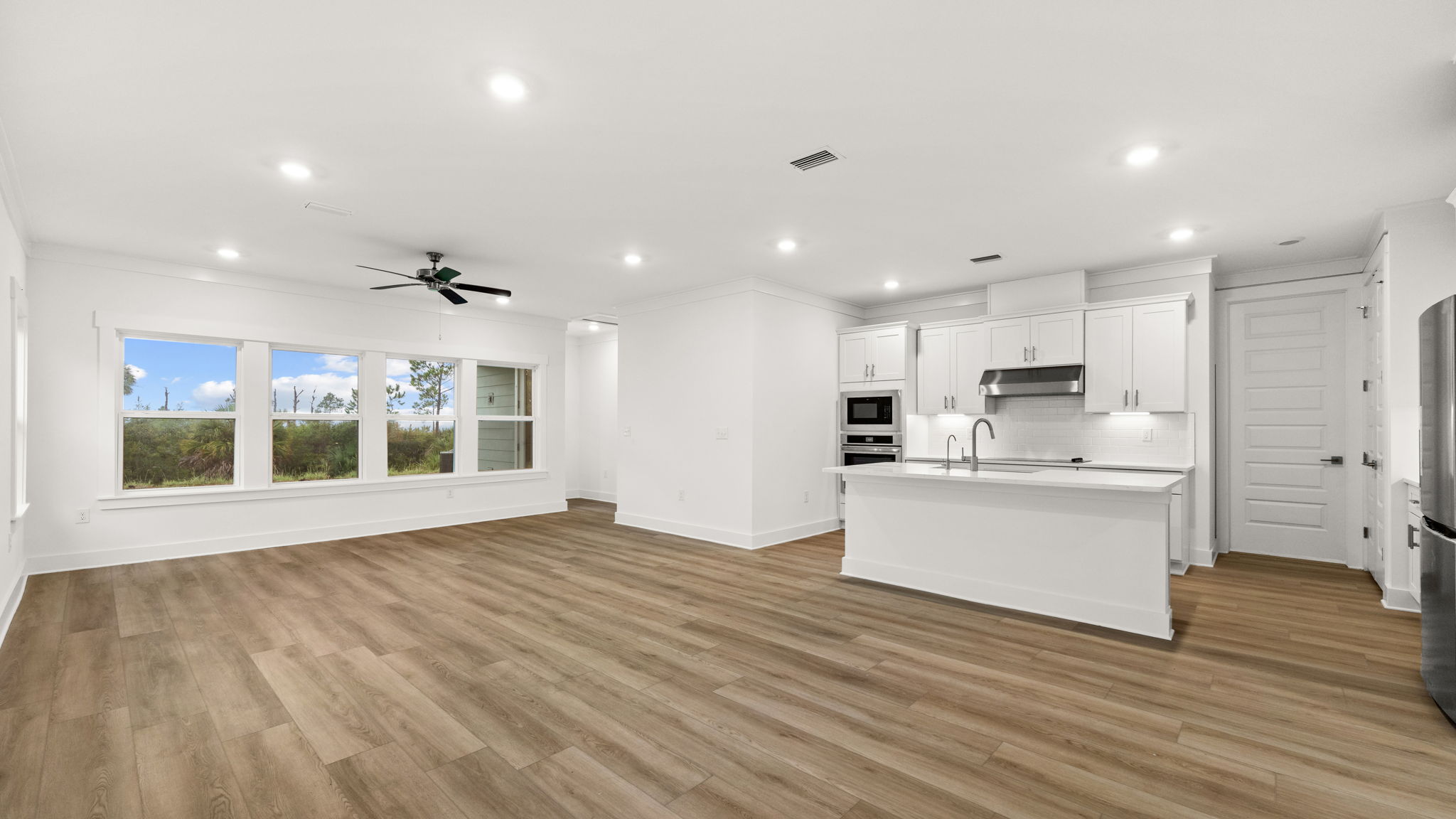 Open living room and kitchen and dining area.