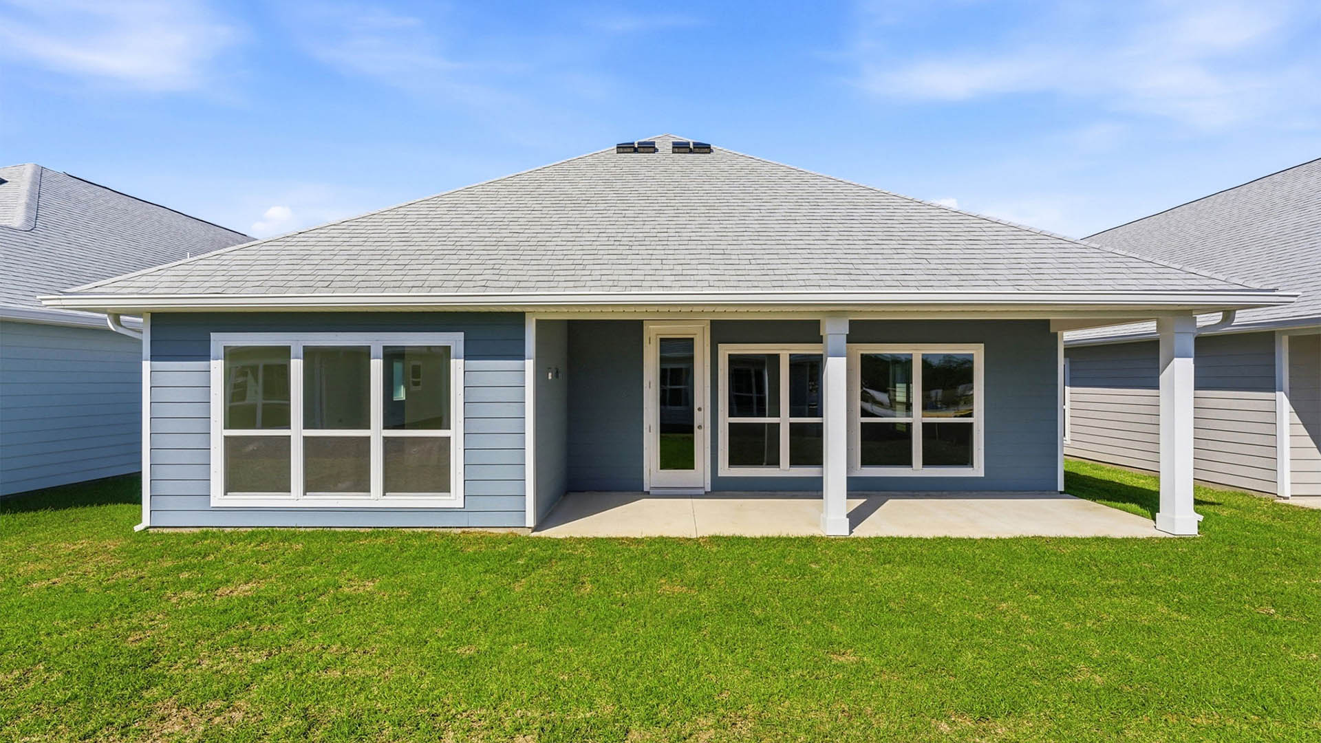 Jubilee plan rear of home with covered patio.
