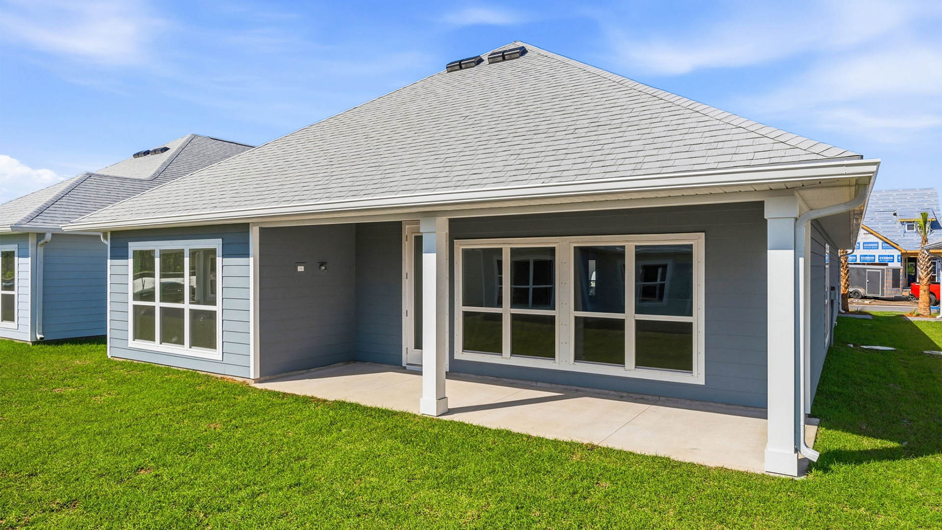Jubilee plan rear of home with covered patio.