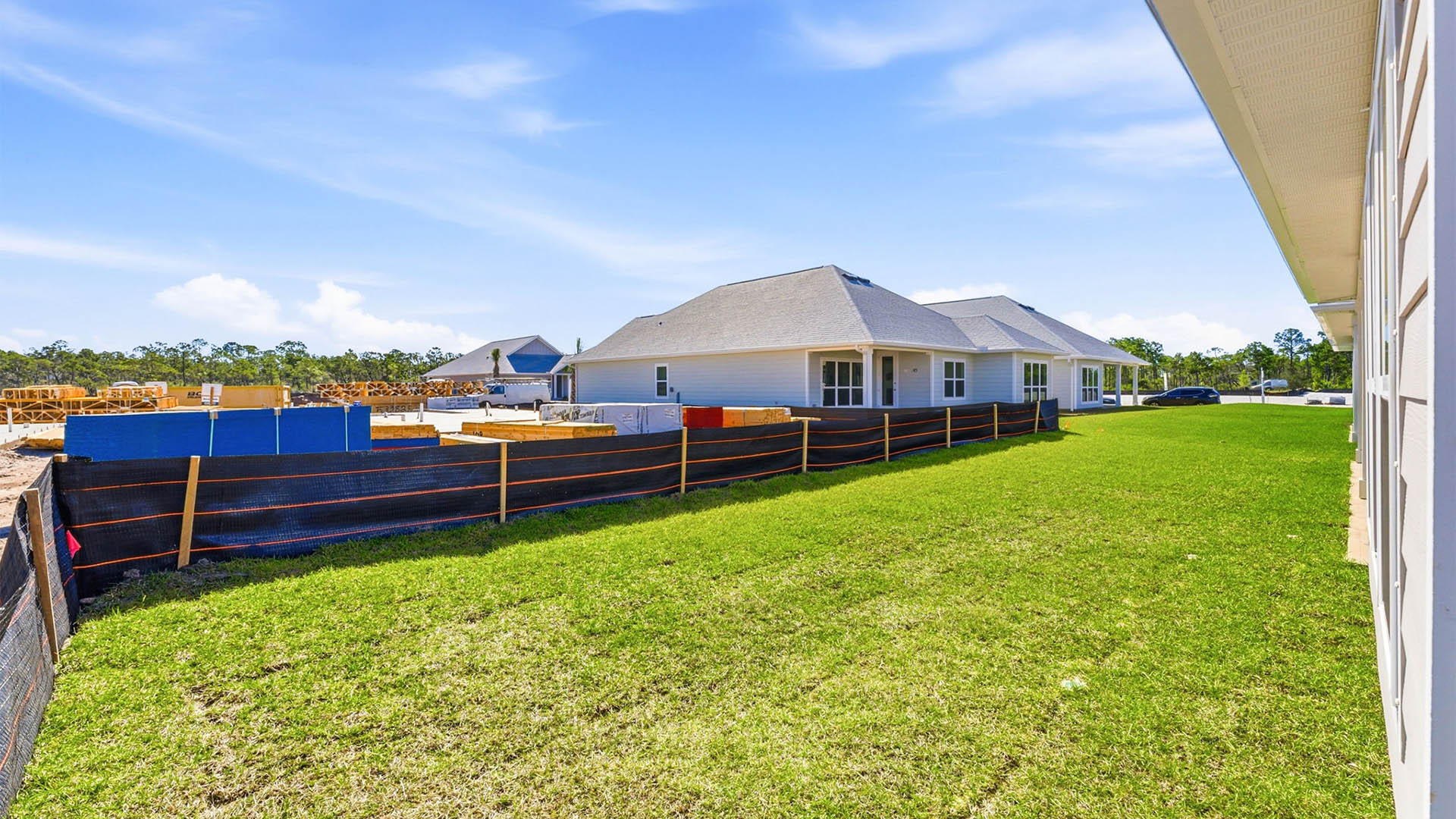 Jubilee plan rear of home with covered patio.