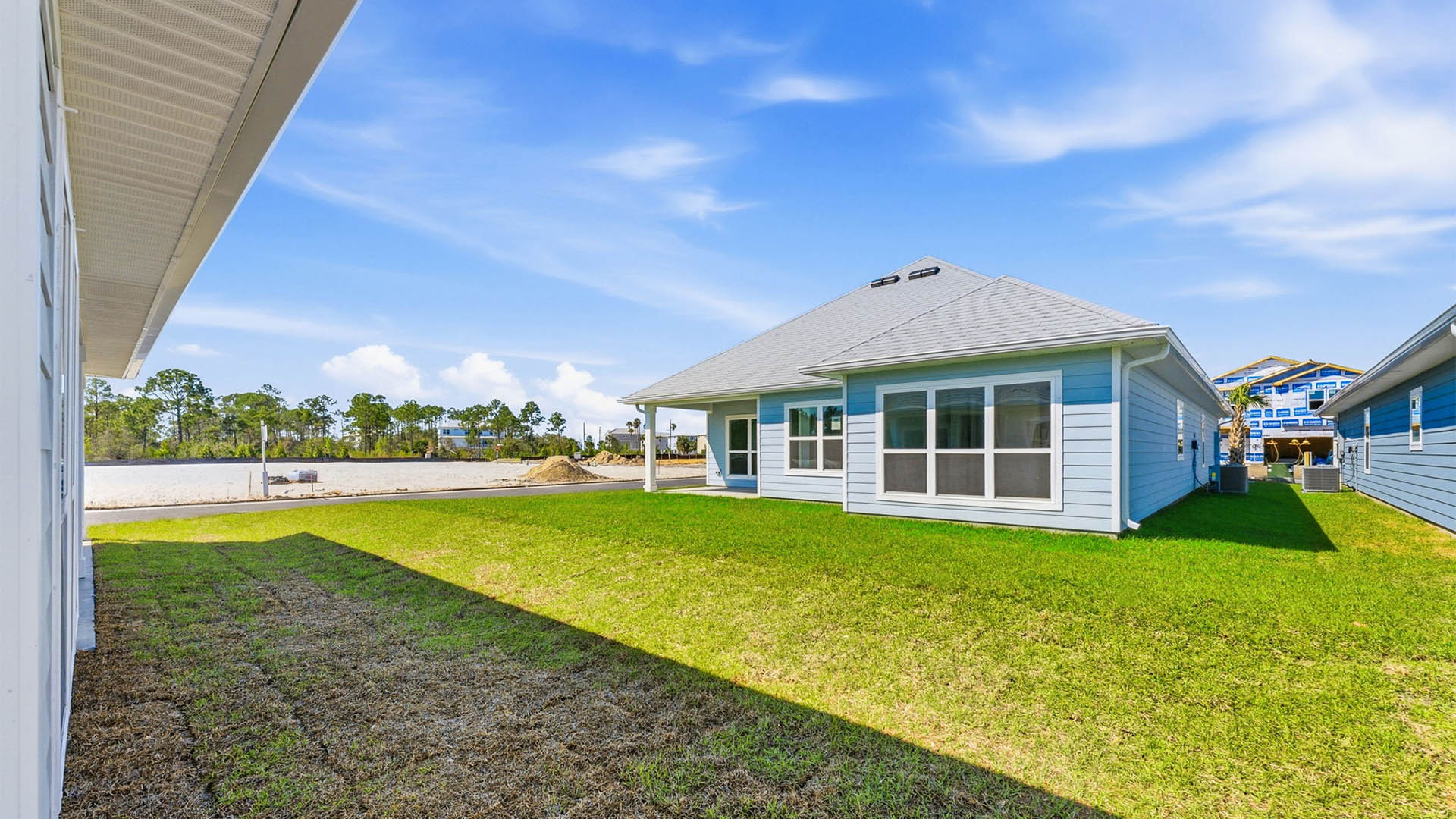 Jubilee plan rear of home with covered patio.