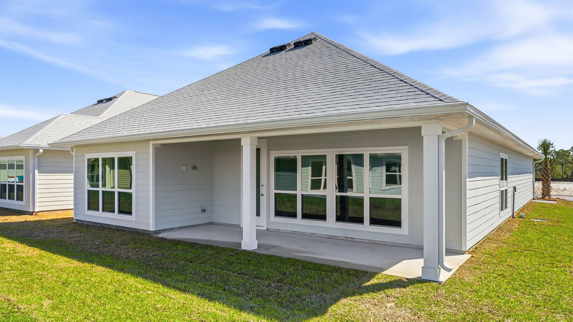 Jubilee plan rear of home with covered patio.