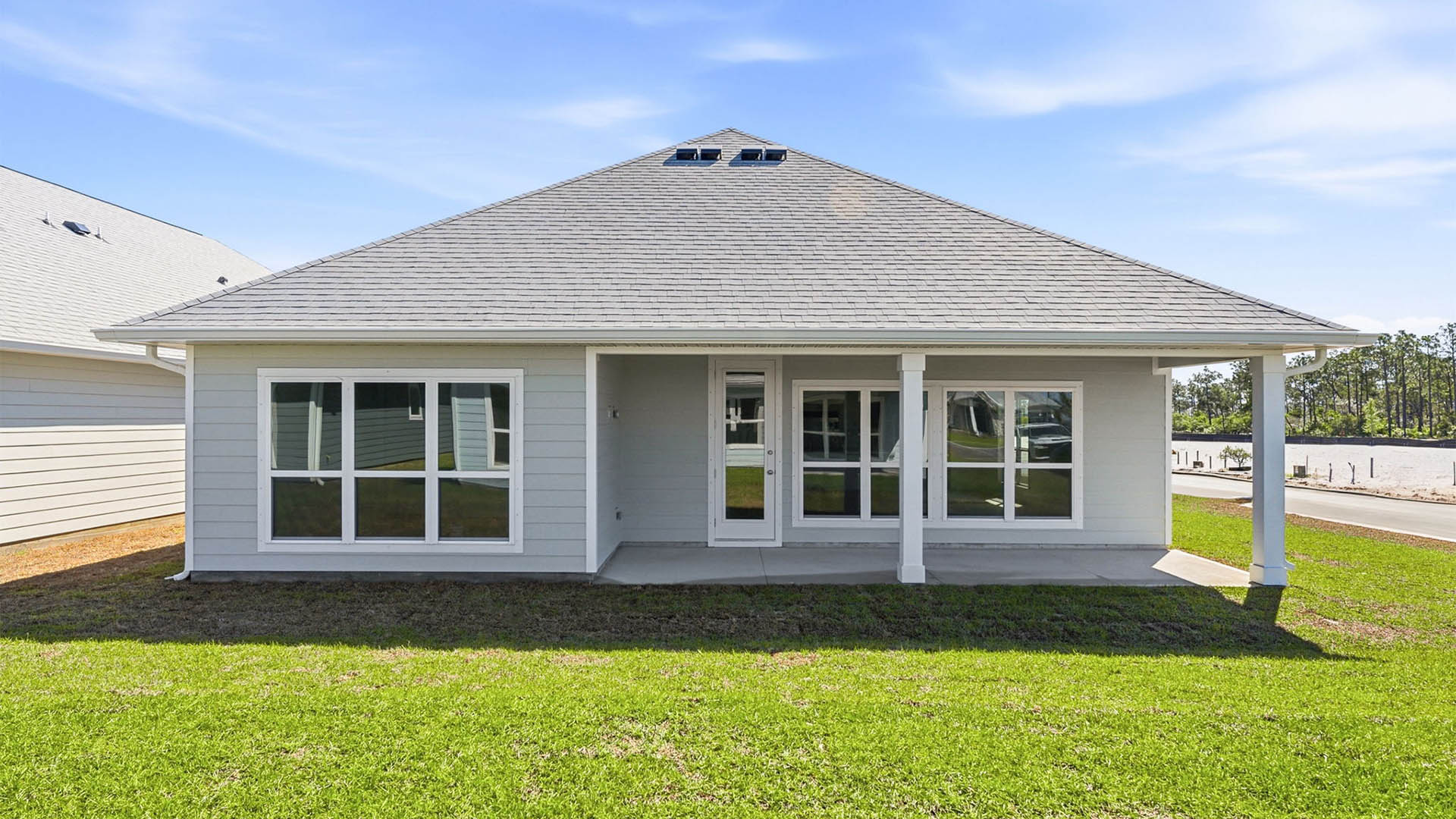 Jubilee plan rear of home with covered patio.