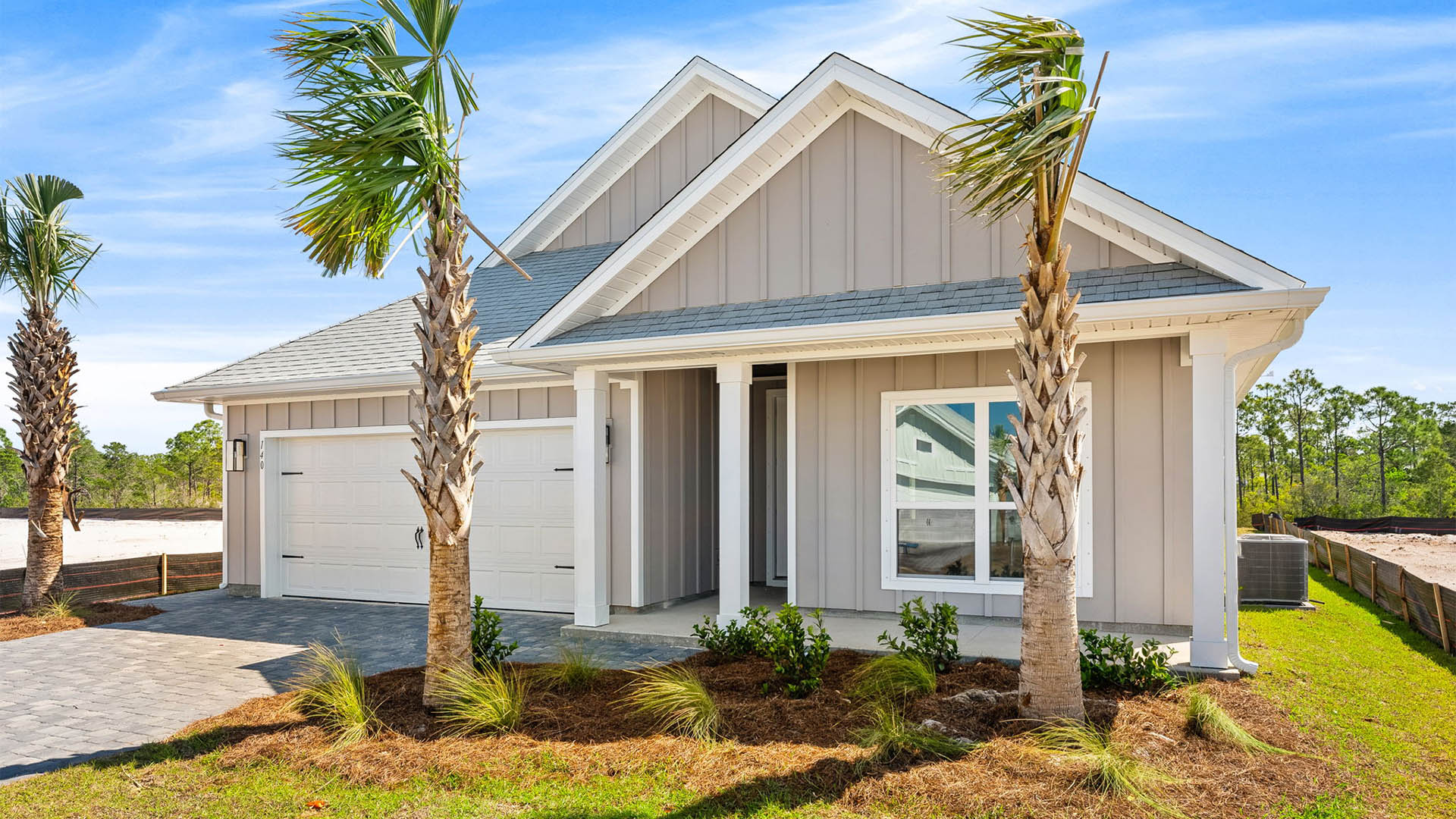 Jubilee plan front of home with Hardie siding and covered front porch.