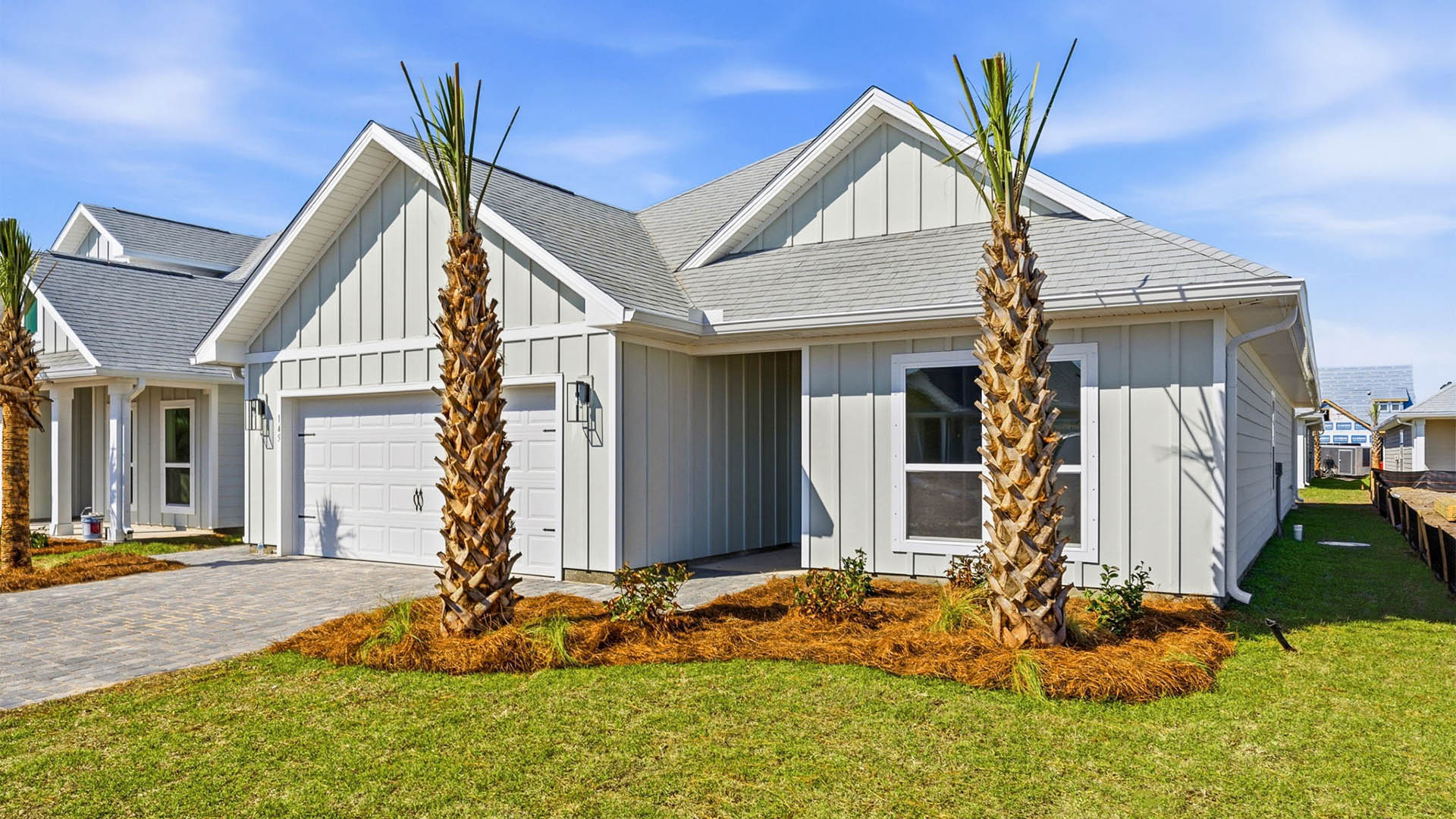 Lily plan front of home with Hardie siding and covered front porch.