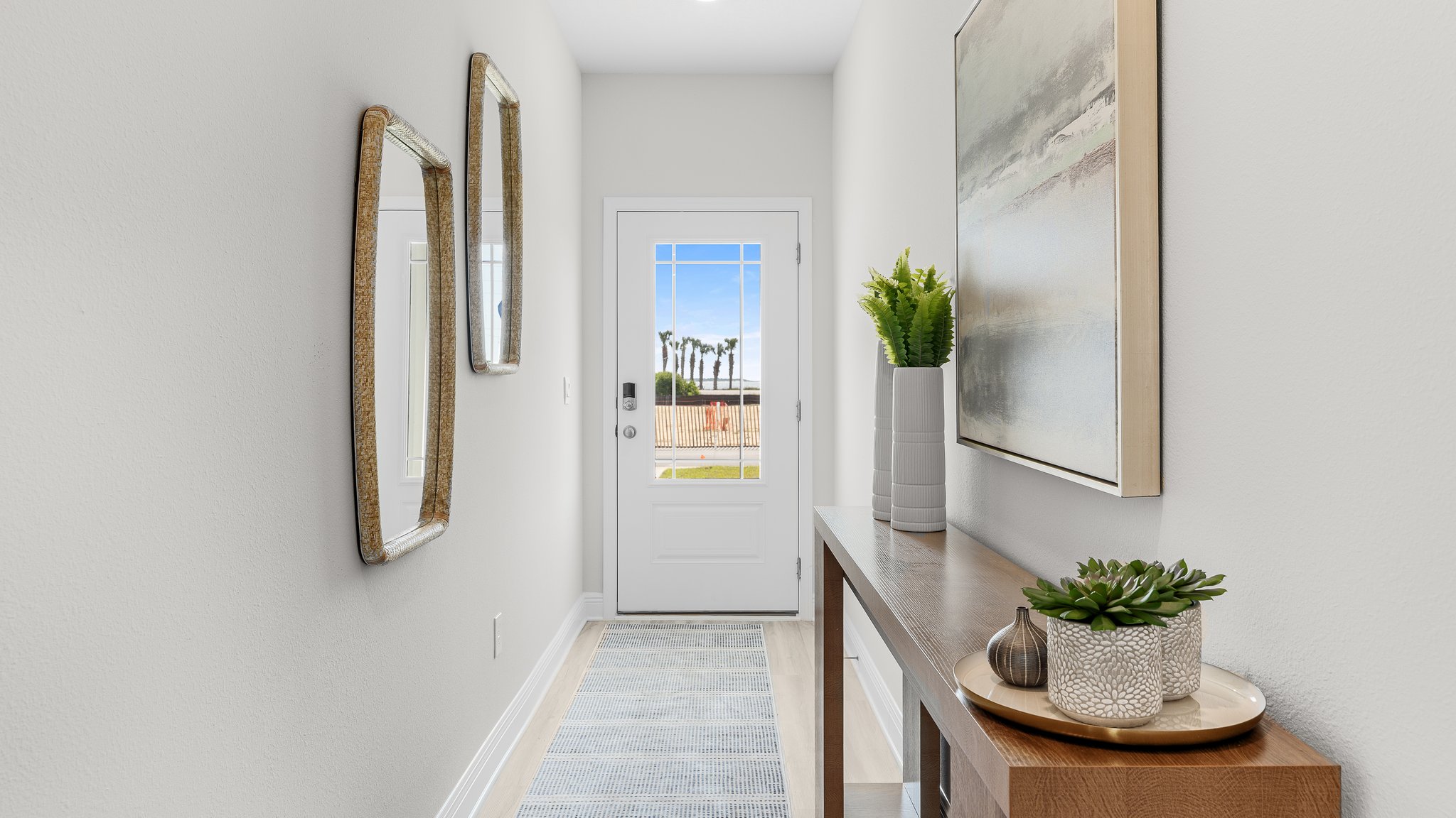 Front hallway with prairie style front door.