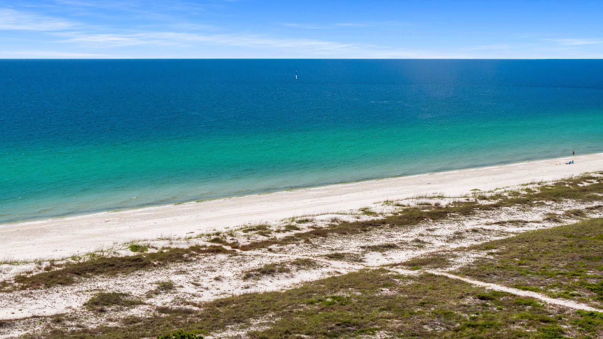 Beach photo across from WindMark Townhomes.