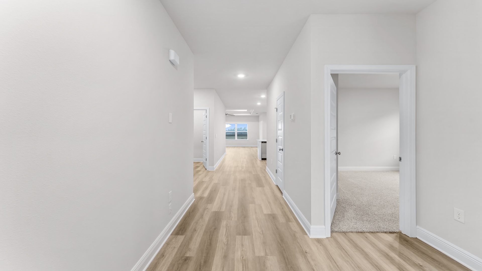 Front entrance and foyer next to front bedrooms and bathroom.