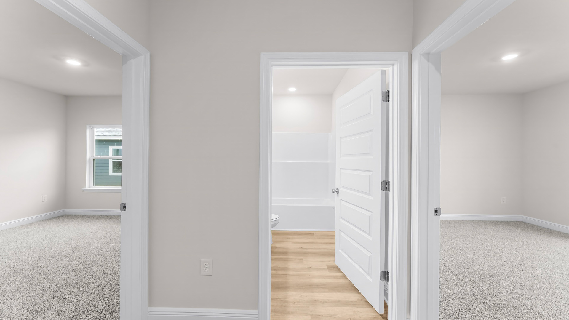Front entrance and hallway next to front bedrooms and bathroom.
