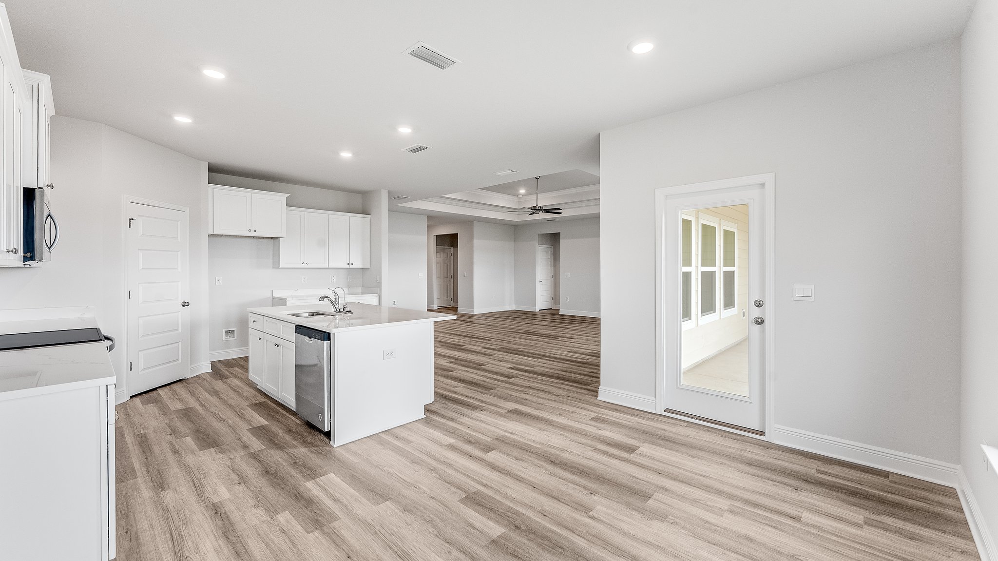 Dining area next to back door and kitchen.
