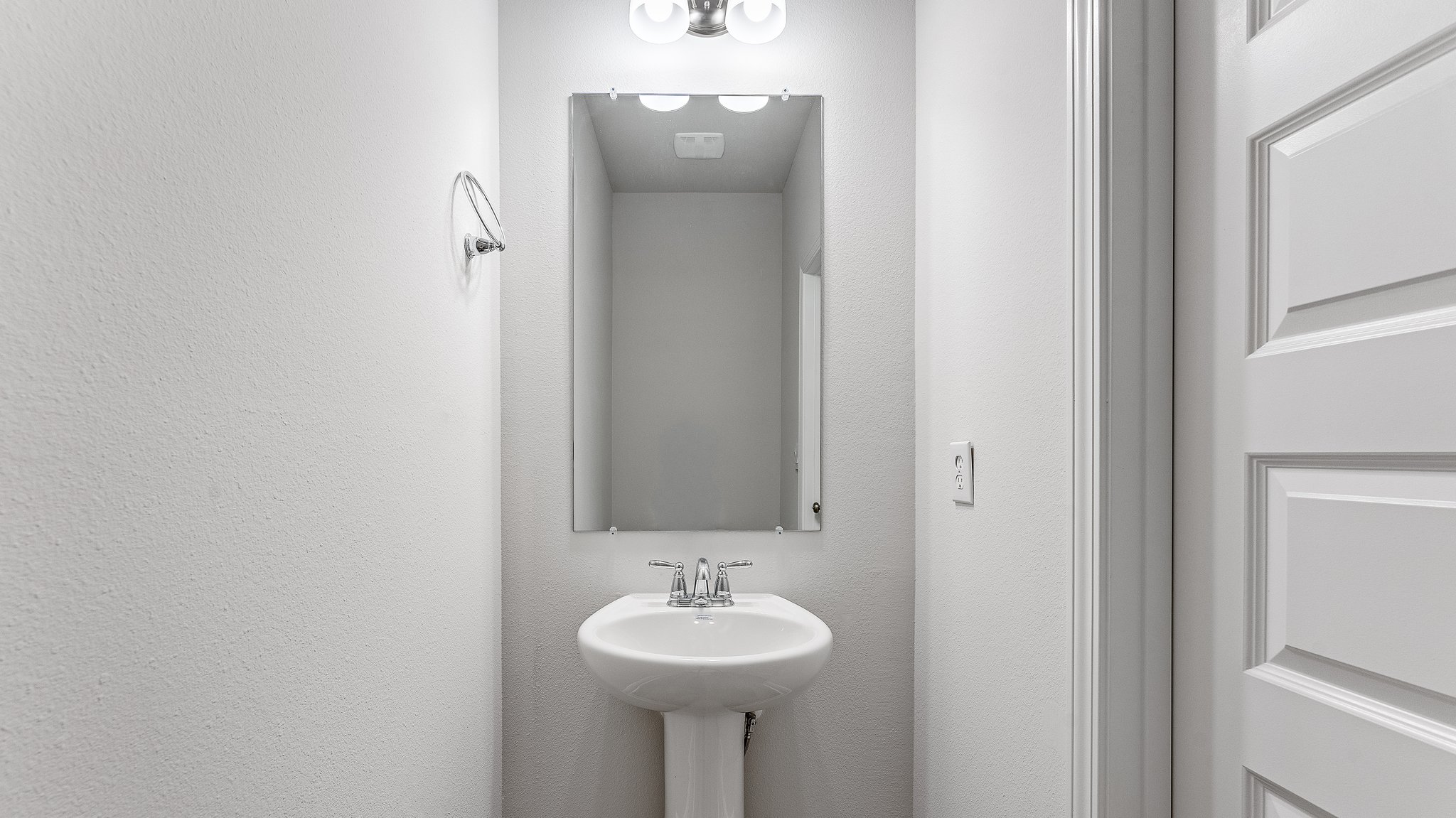 Half bathroom with sink.