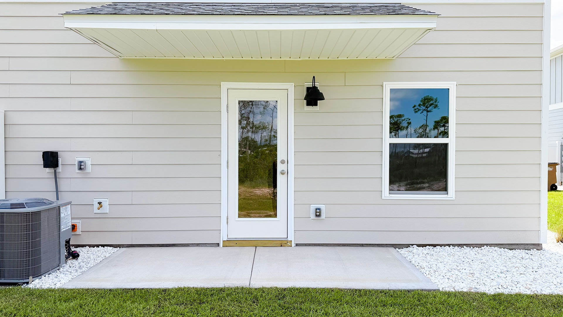 Covered rear patio.