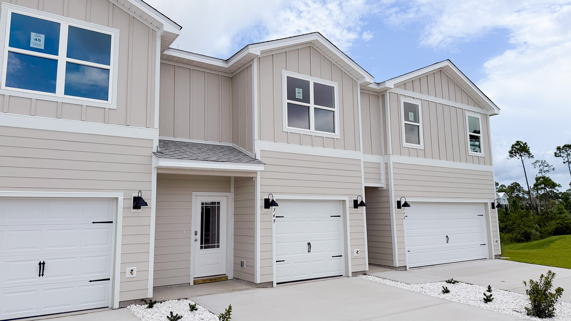 Sabal townhome interior unit with Hardie board siding and single car garage.