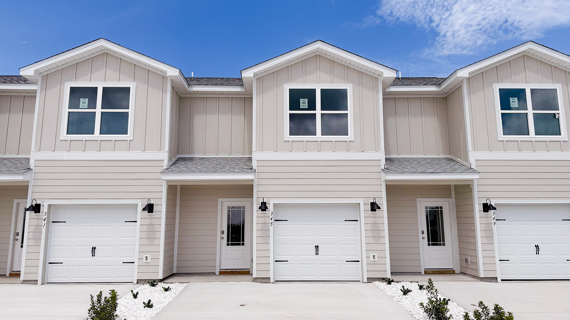 Sabal townhome with single car garage and Hardie siding.