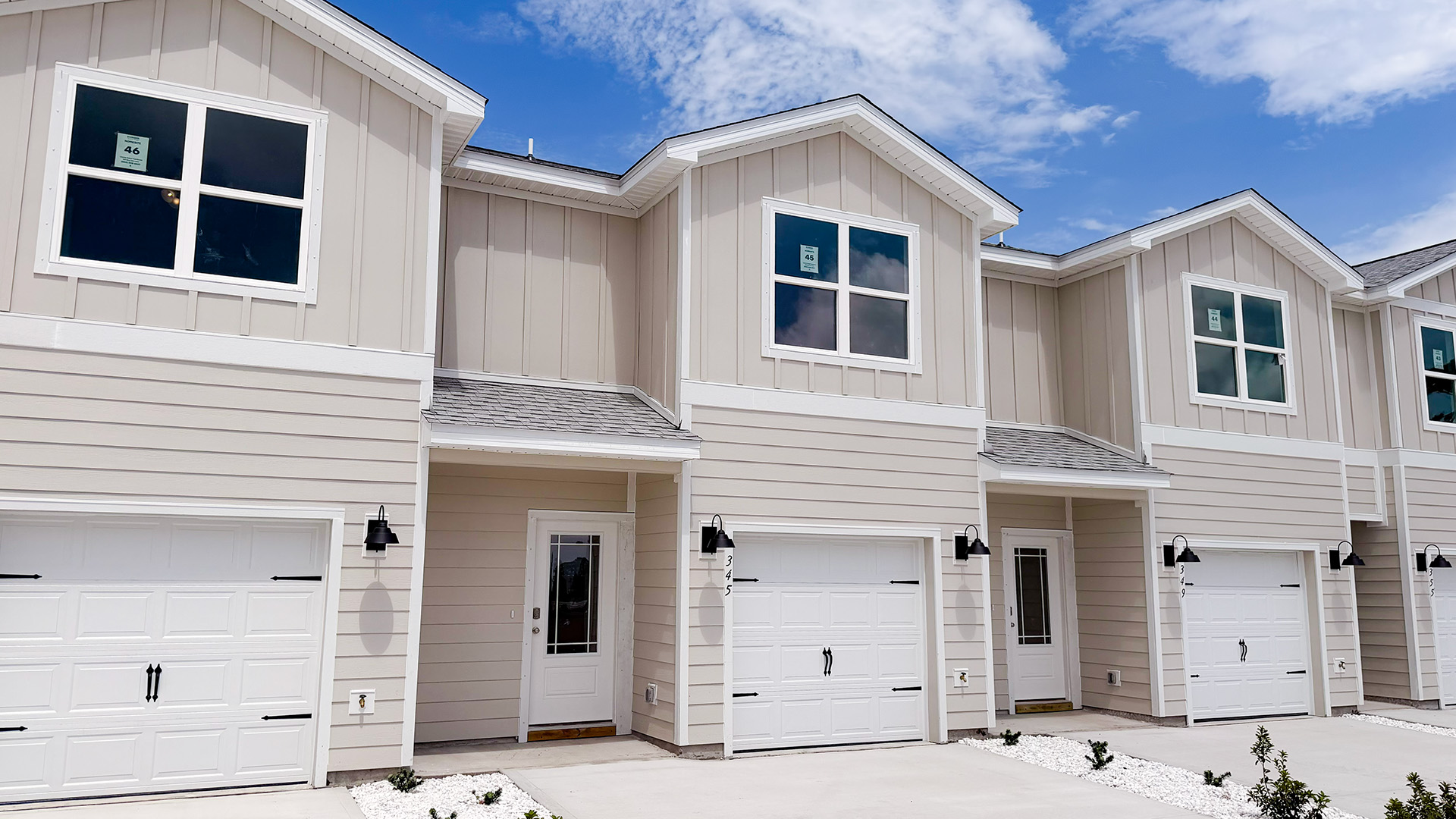 Sabal townhome with single car garage and Hardie siding.