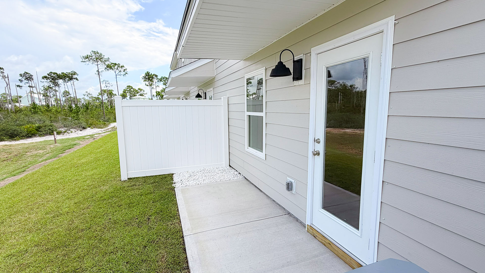 Covered rear patio.
