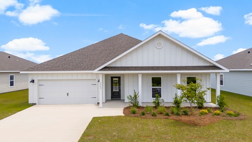 Victoria floor plan at Liberty with Hardie Board siding and large covered front porch and two car garage.