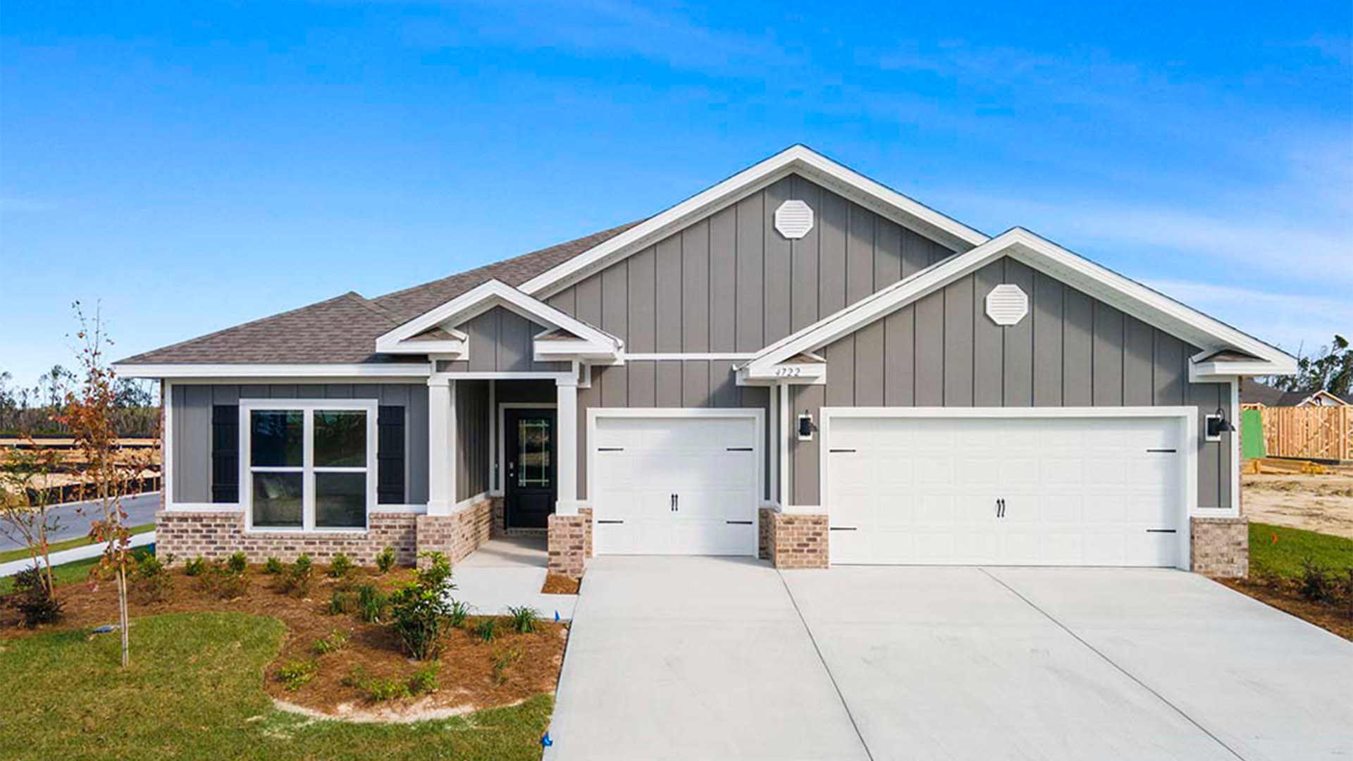Camden floor plan at Liberty with 3 car garage and Hardie siding.