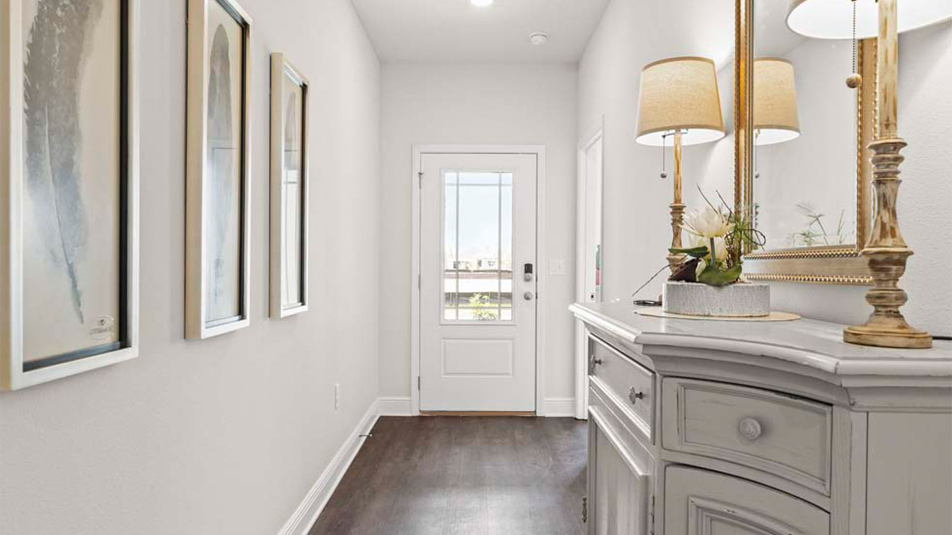 Front entrance with EVP flooring next to bedrooms and bathroom.