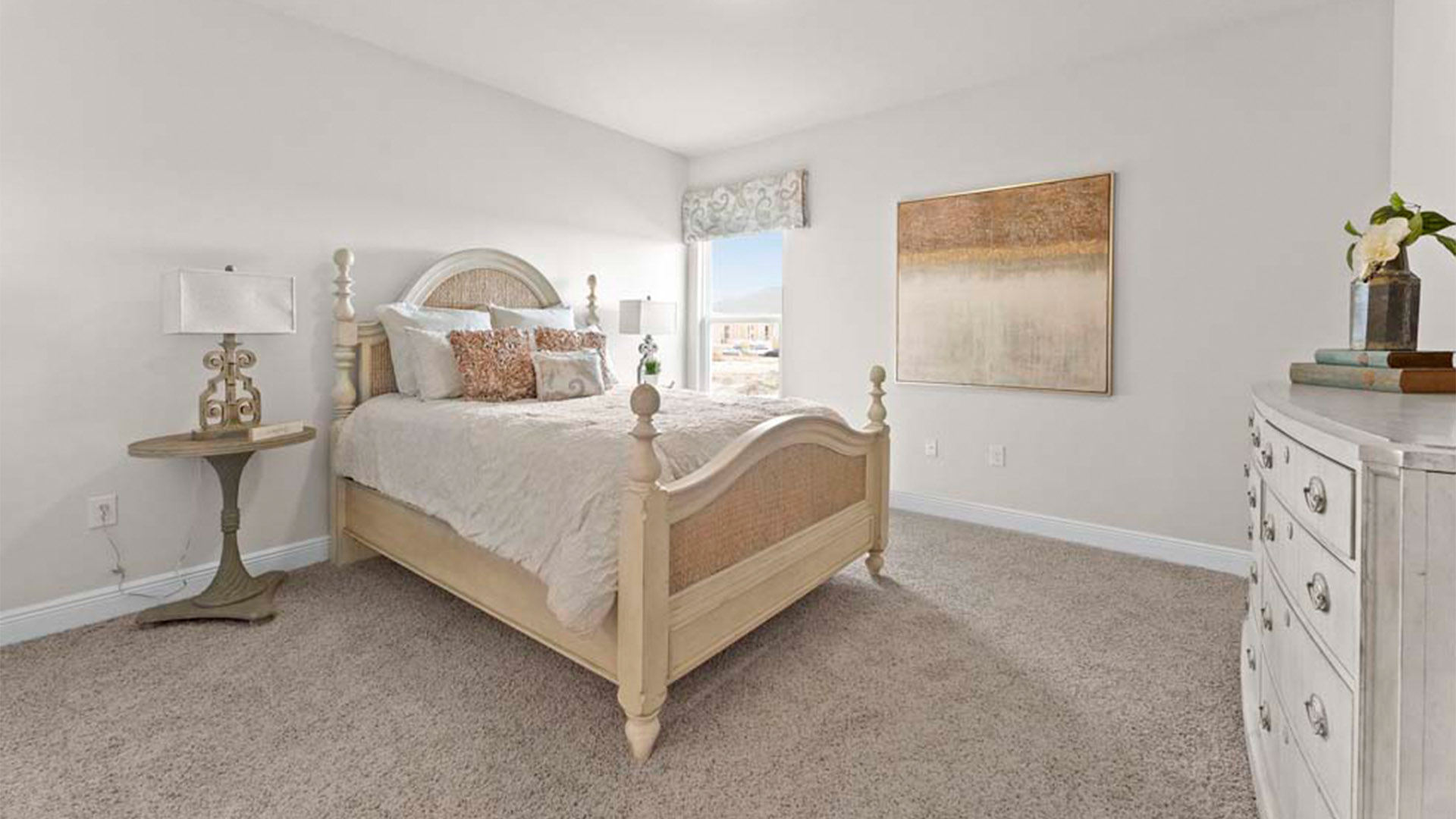 Bedroom with carpet floors and window.