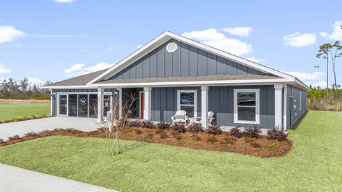 Victoria floor plan at Liberty with Hardie Board siding and large covered front porch and two car garage.