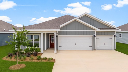 Madison at Liberty with 3 car garage and covered front porch.