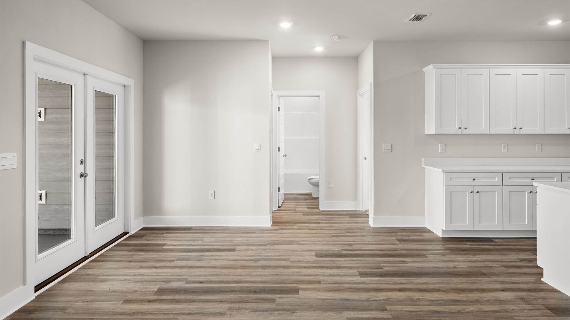 Back door area next to bedrooms and bathroom and kitchen.