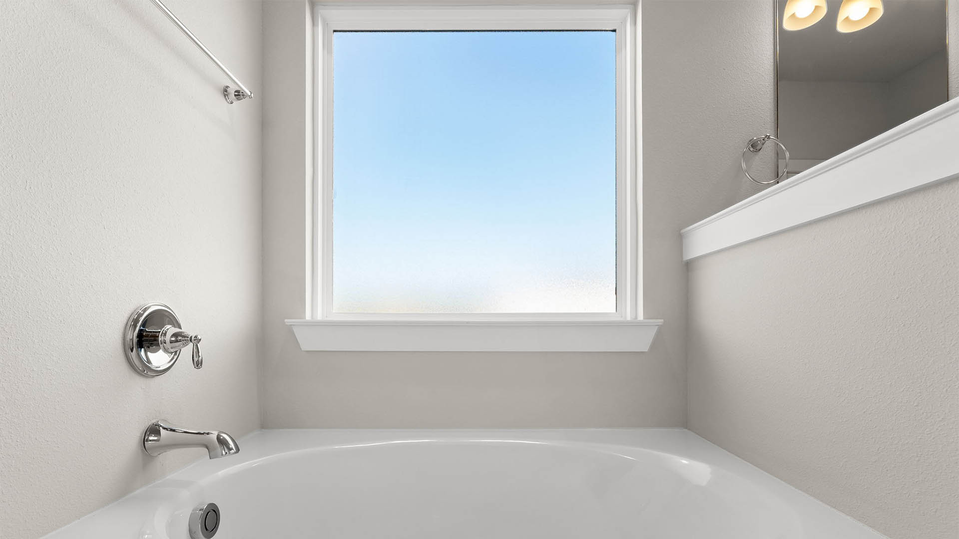Tub with opaque frosted window.