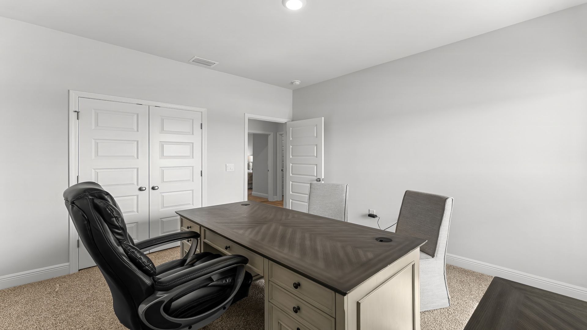 Bedroom with carpet floors and closet.