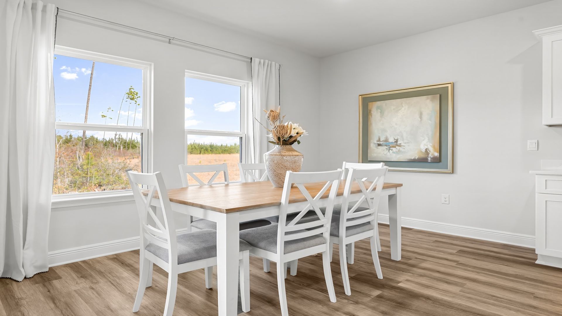 Dining area next to back door and kitchen.