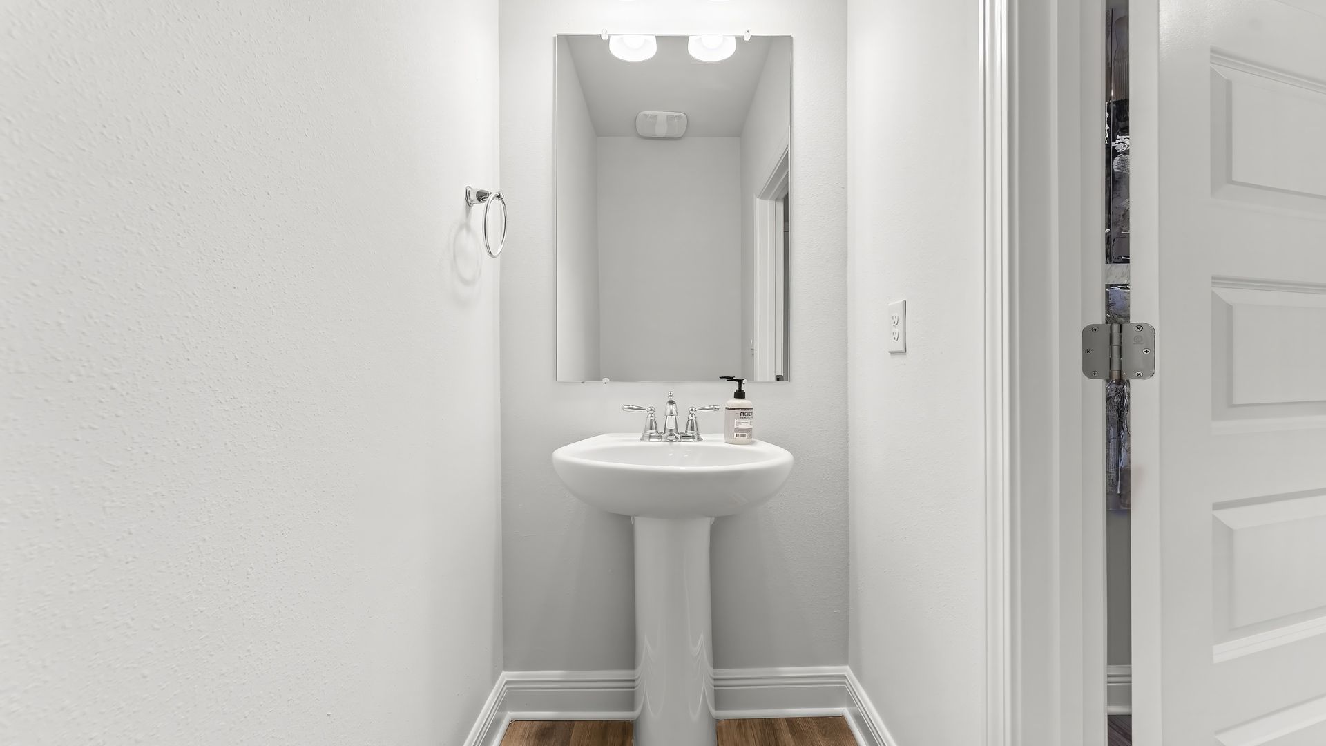 Half bathroom with sink.