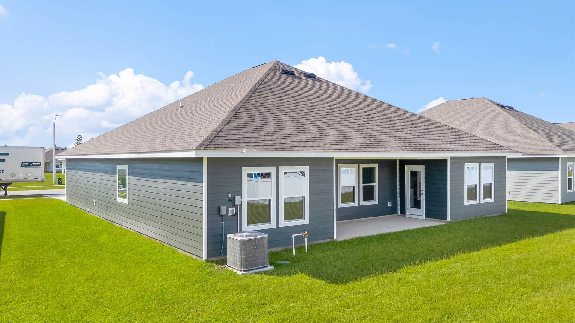 Victoria floor plan rear of home with covered rear patio.
