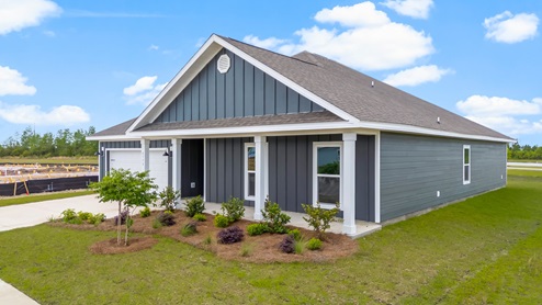 Victoria floor plan at Liberty with Hardie Board siding and large covered front porch and two car garage.