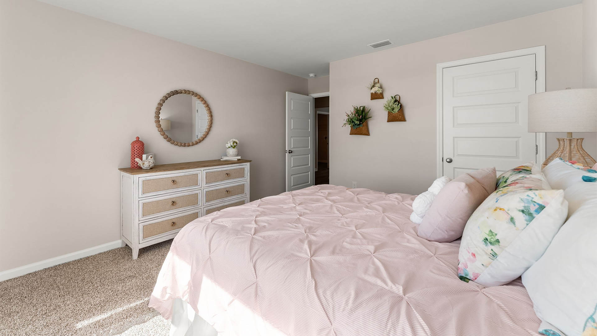 Bedroom with carpet floor and closet.