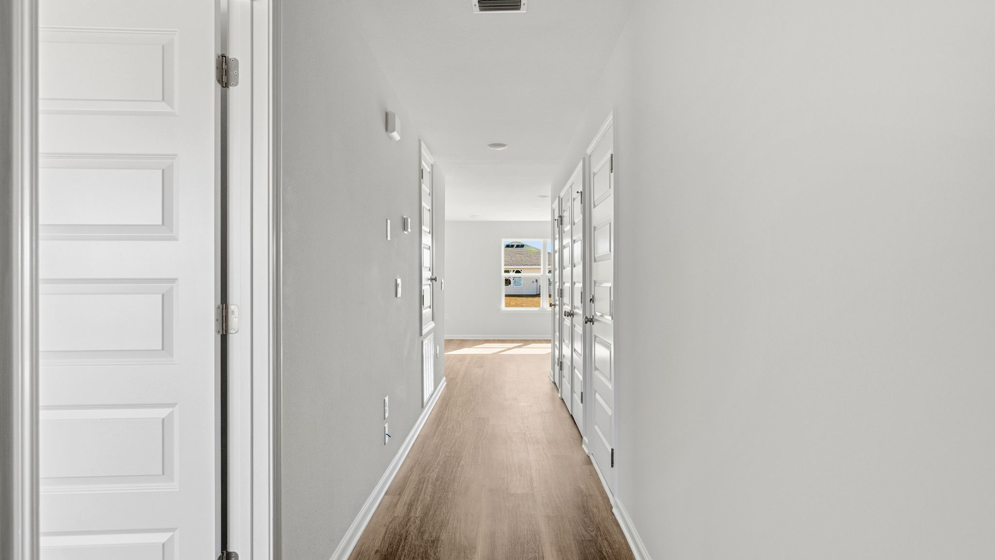 Front entrance hallway next to primary bedroom.
