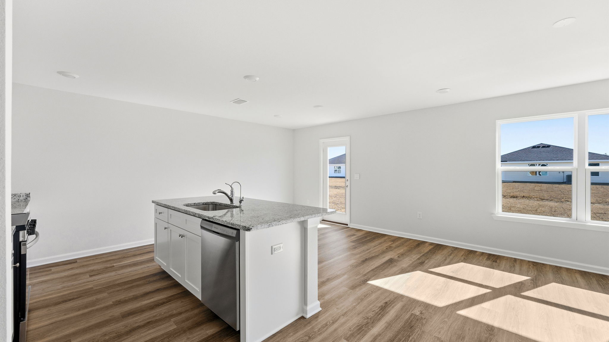 Kitchen island and dining area view.