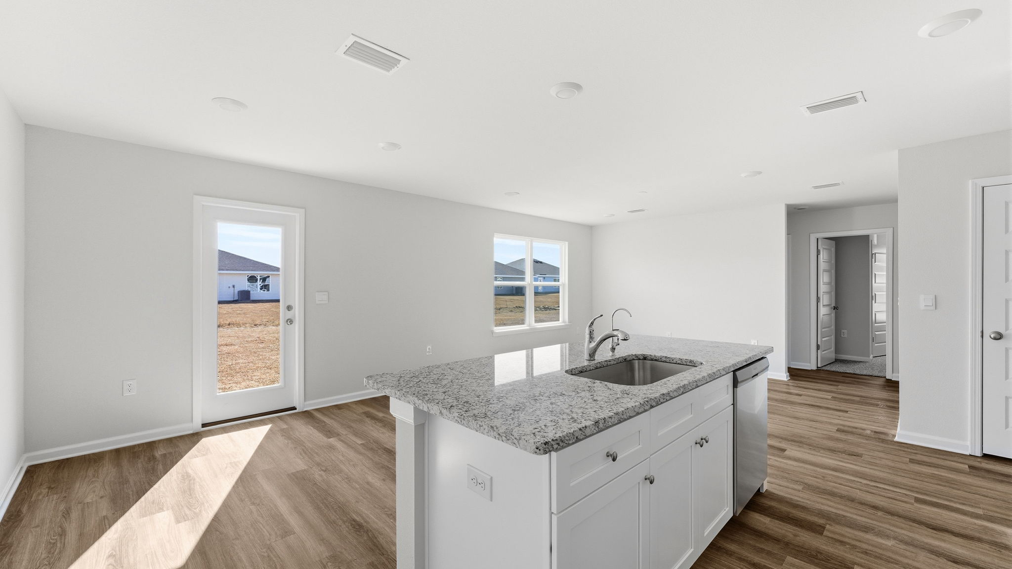 Kitchen island and living room view.