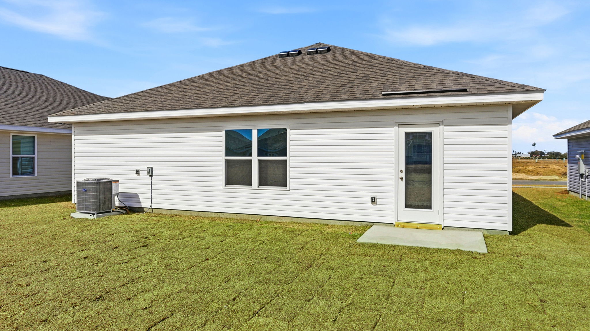 Aldridge plan with back patio and back yard.