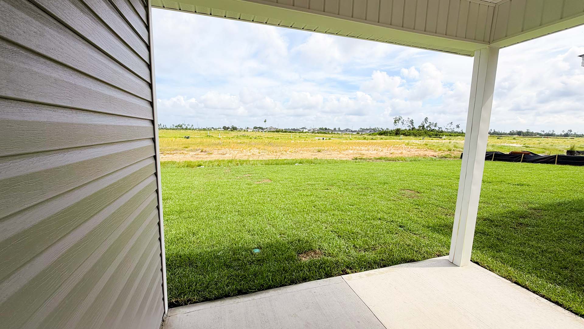 Rear patio view of back yard.