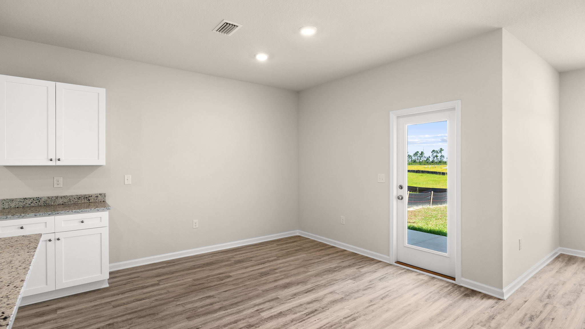 Dining area next to back door.