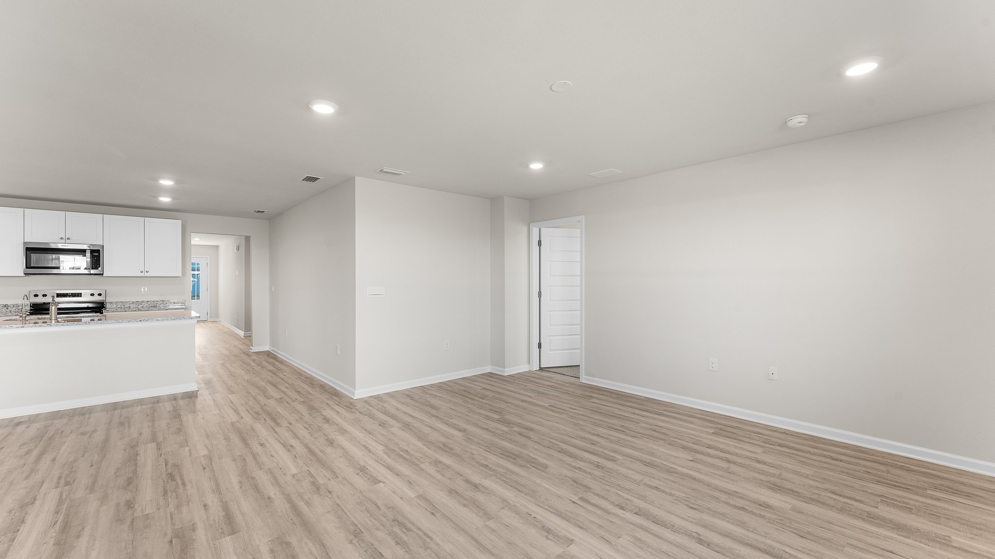 Living room with EVP flooring.