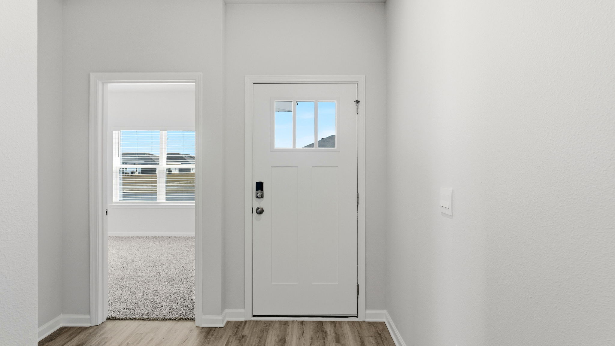 Front entrance next to Primary Bedroom.