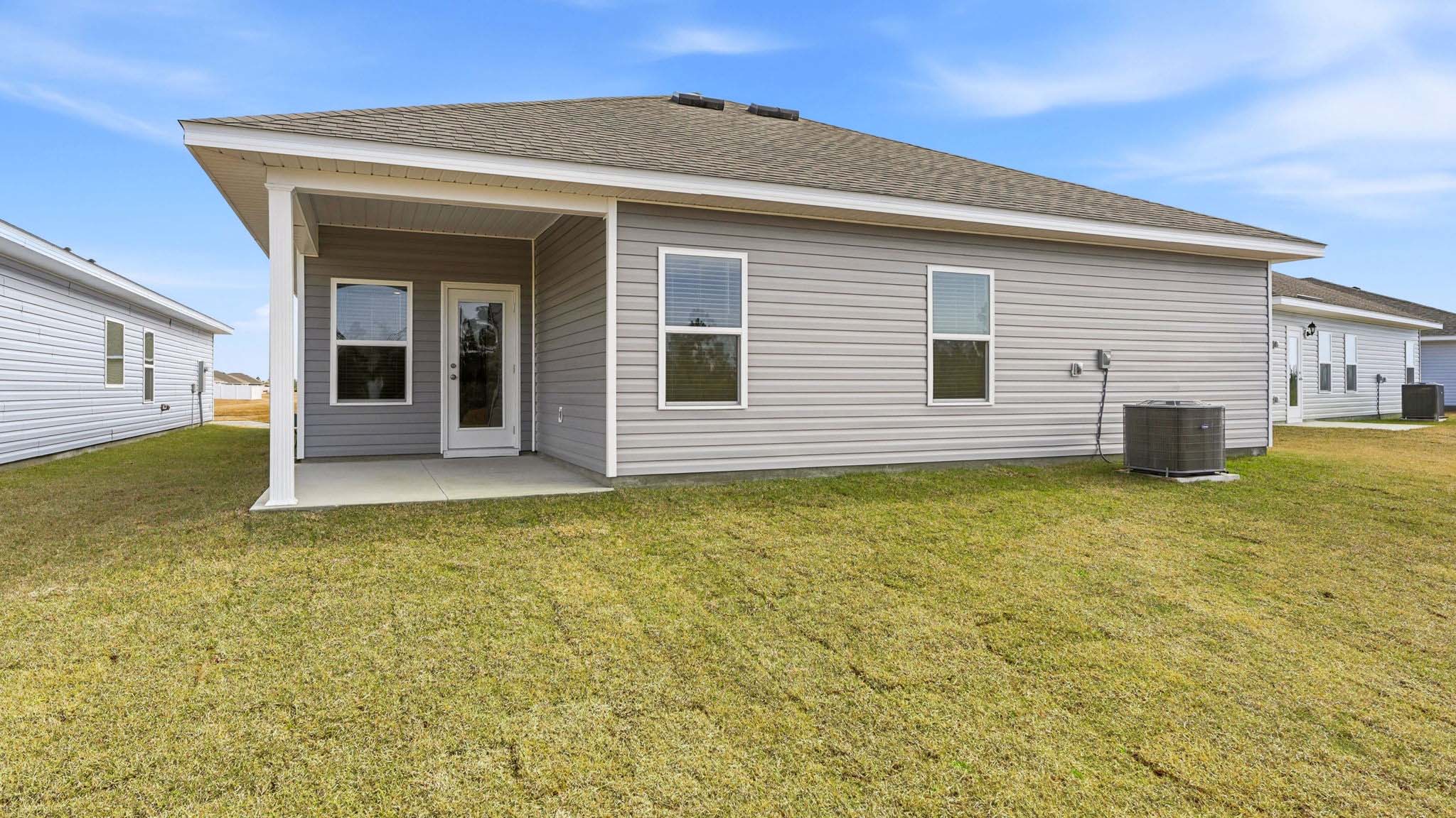 Creekside plan at Liberty rear of home with covered rear patio.