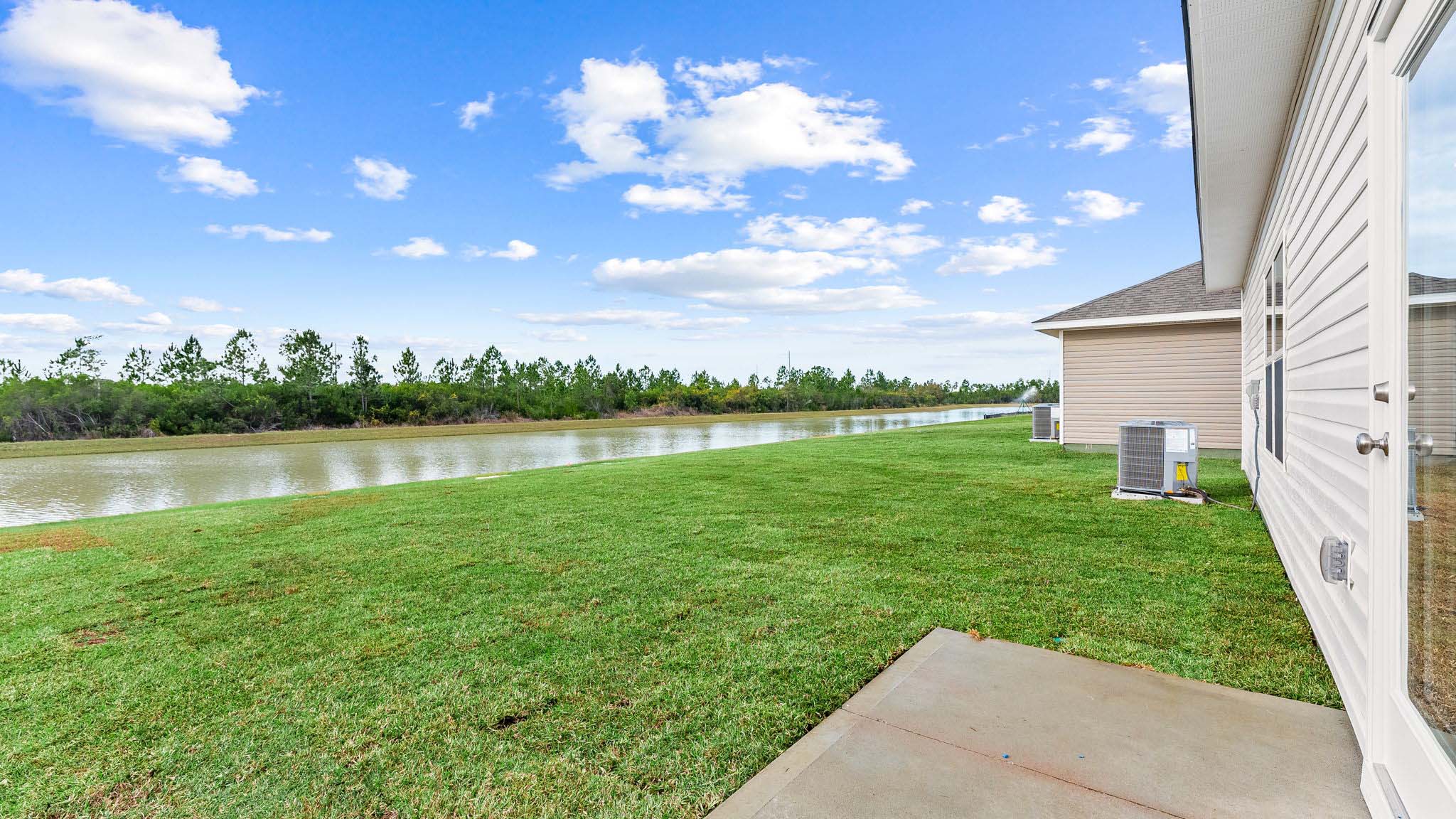Back yard view of pond.