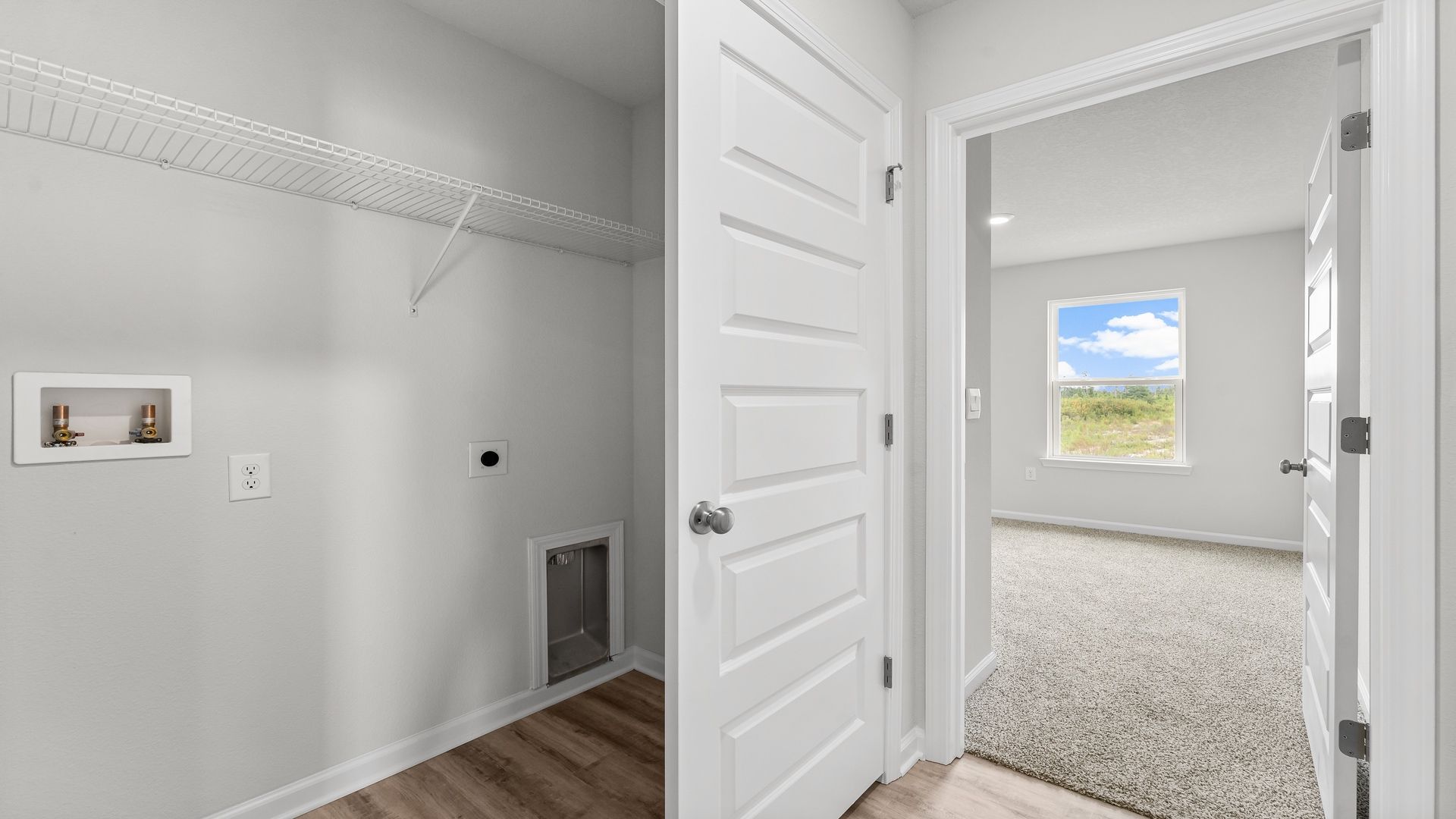 Laundry room with ventilated shelving.