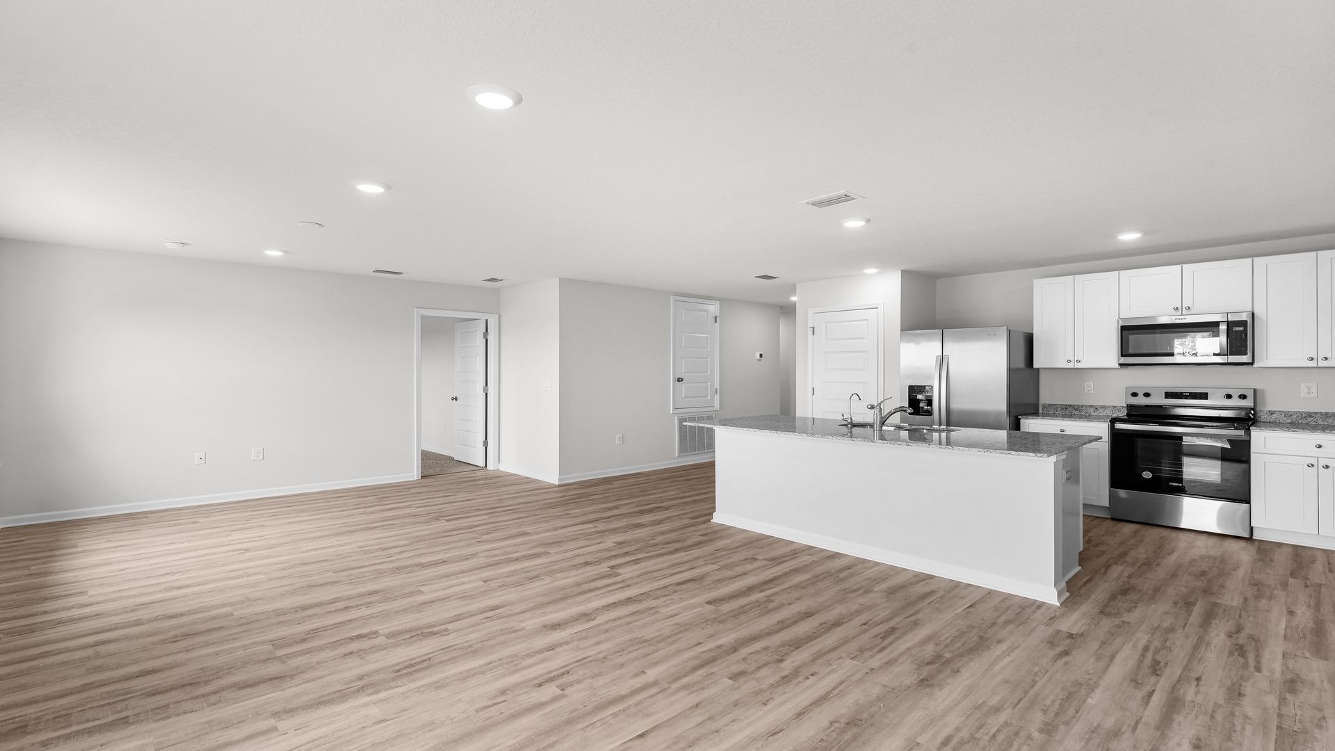 Open living room and kitchen and dining room.