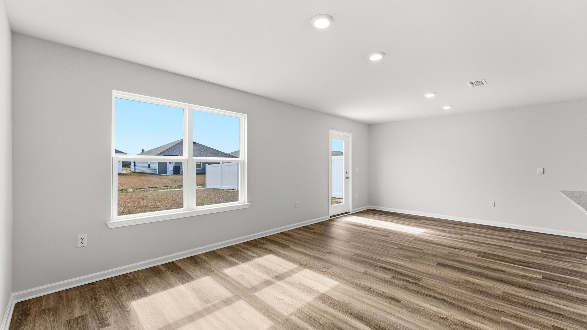 Open living room and kitchen and dining room.