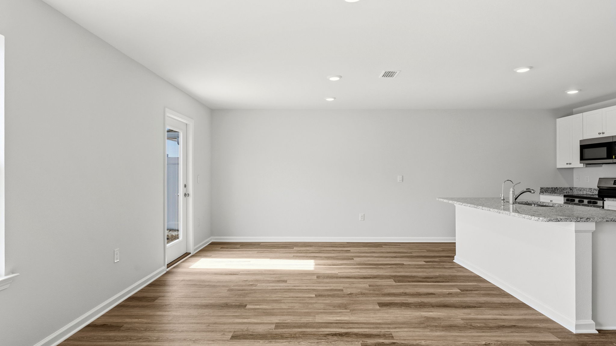Open living room and kitchen and dining room.